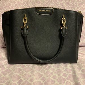 Authentic Michael Kors handbag. New without tags.